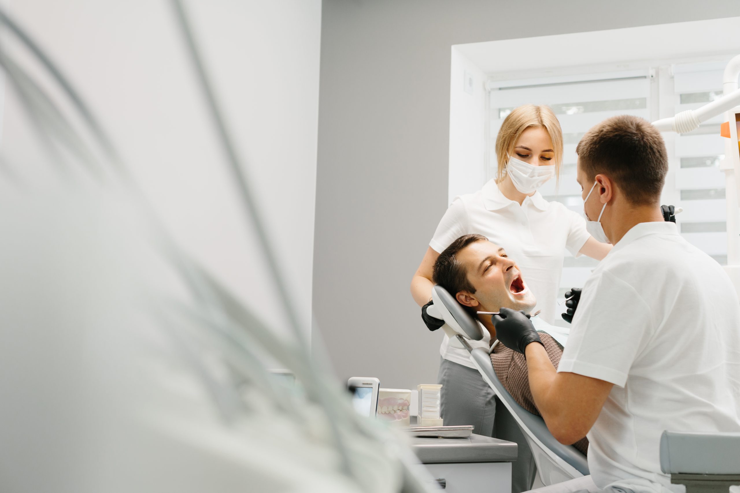 A patient learning about tooth replacement options for missing teeth.