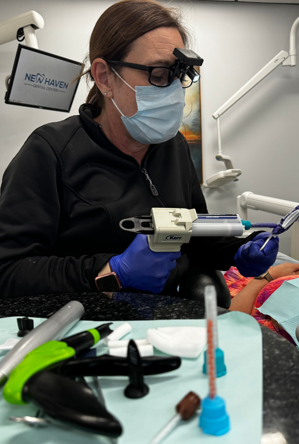 Assistant helping get a patient out of pain